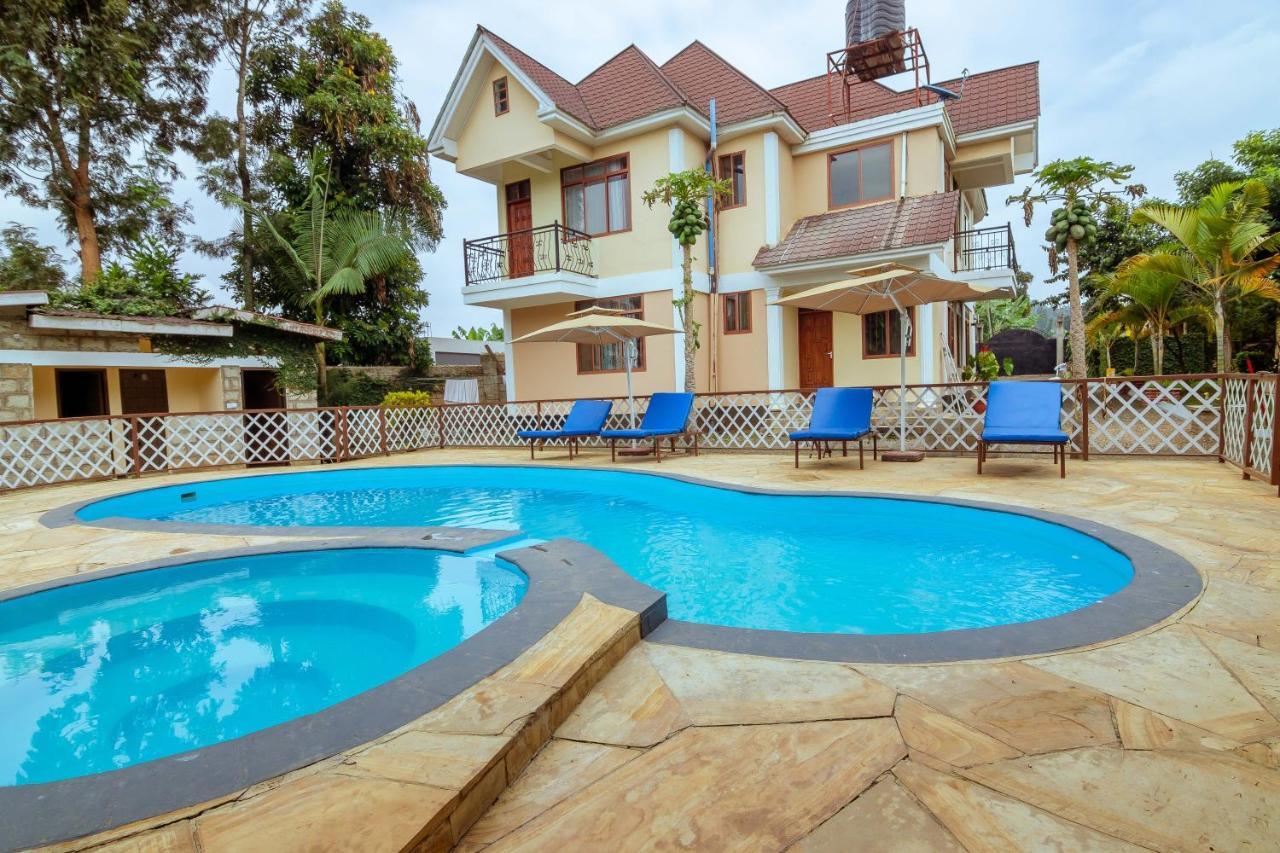Rayan Apartments & Safaris Аруша Экстерьер фото
