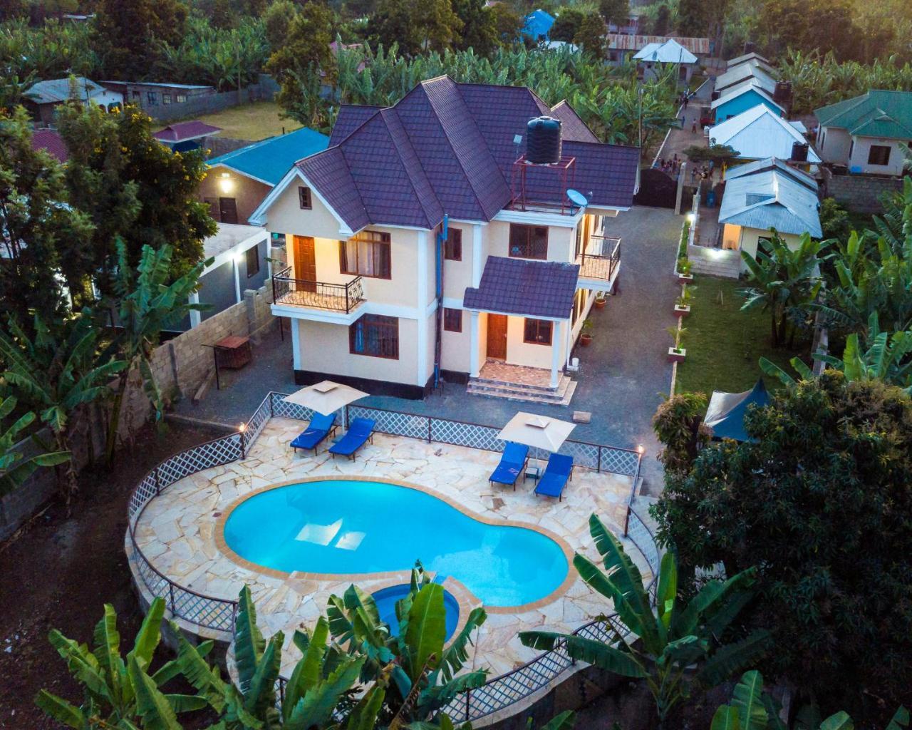 Rayan Apartments & Safaris Аруша Экстерьер фото